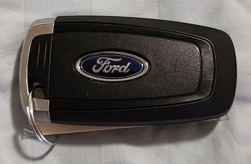 Pre-owned-oem - 4 button key fob  2015-2020 ford f150