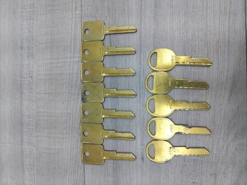 Gm car key blanks. nos.  7 ignition, 5 door. gold color