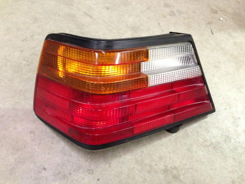 W124 mercedes benz driver's side left original tail light lens