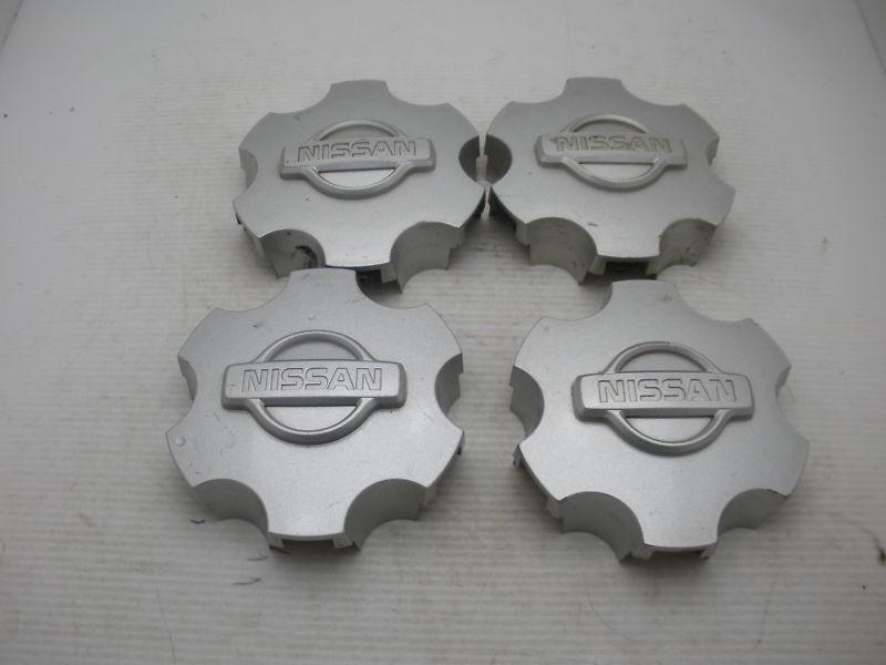 Lot of 4 01 02 03 04 nissan frontier 40315-9z400  wheel center caps hubcaps