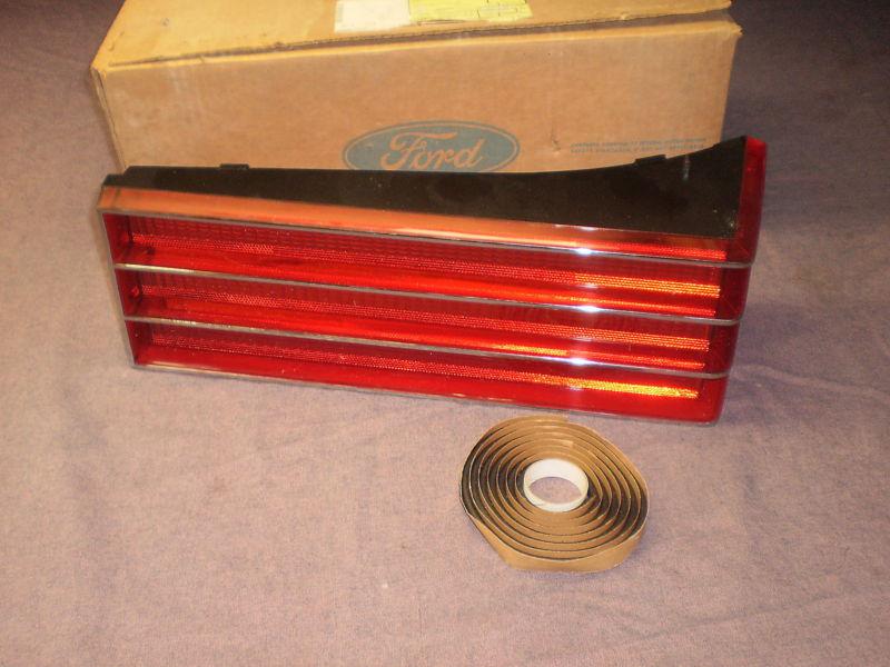 Mercury 79,82 fullsize tail lamp lens rh orig. ford nos