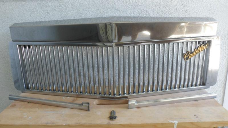 1988 cadillac grill with hood assembly nose and side trim pieces