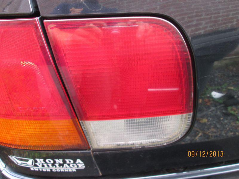 96 97 98 honda civic 4dr sedan left trunk mounted tail light