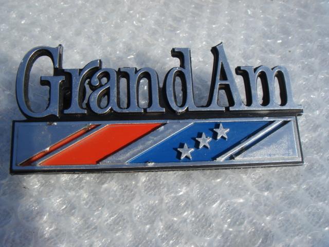 73 74 75 pontiac " grand am " fender emblem #1 gm part # 490627  l-7000 rare