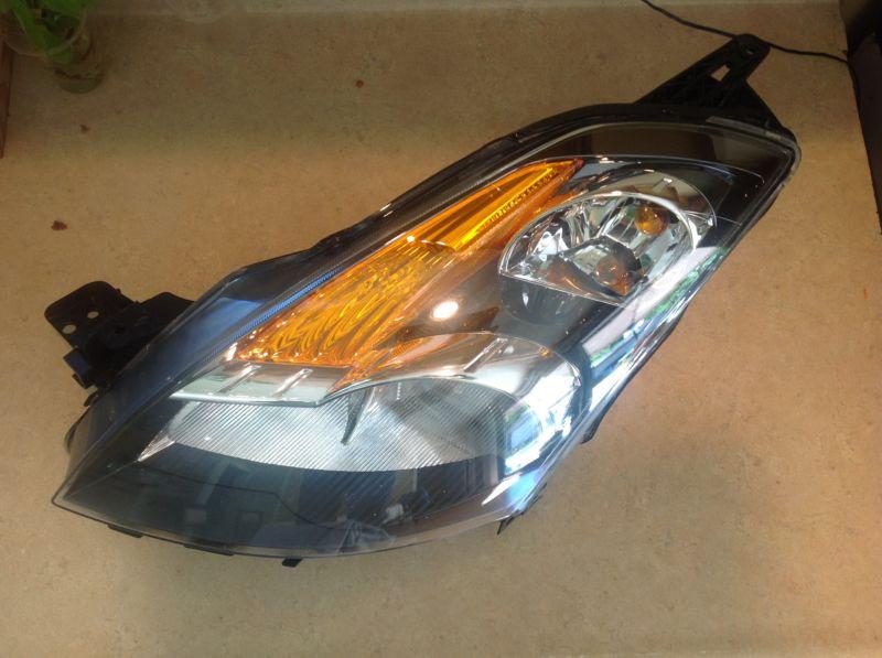 Nissan altima 2009 oem driver side headlight  left side