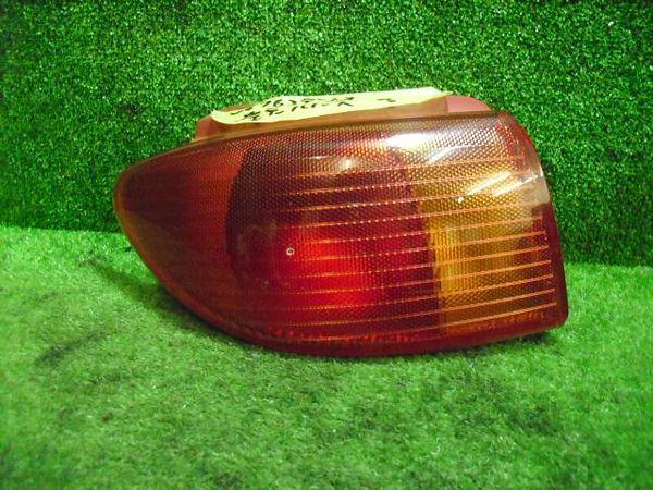 Mazda demio 2002 rear left combination lamp [6315600]