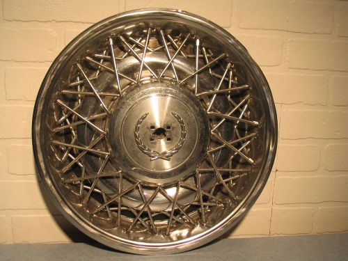 75-85 cadillac deville fleetwood wire wheel cover / hubcap in very good shape!