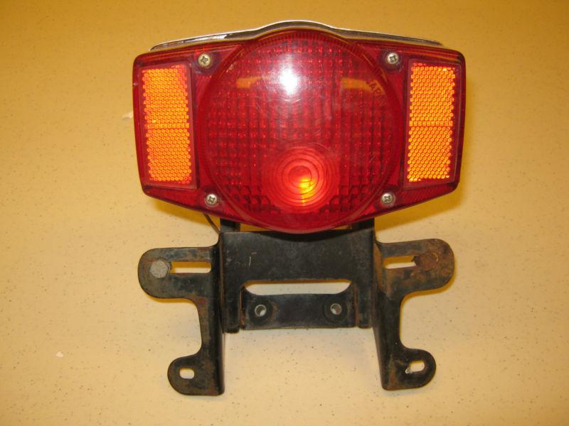 Honda  cb tail light assembly -  with lens and bracket - fits early 70's cb's