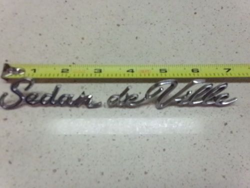 Circa 1968 cadillac sedan deville script nameplates