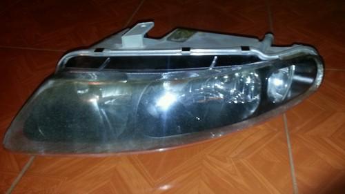 1998 98 dodge avenger driver headlight assembly