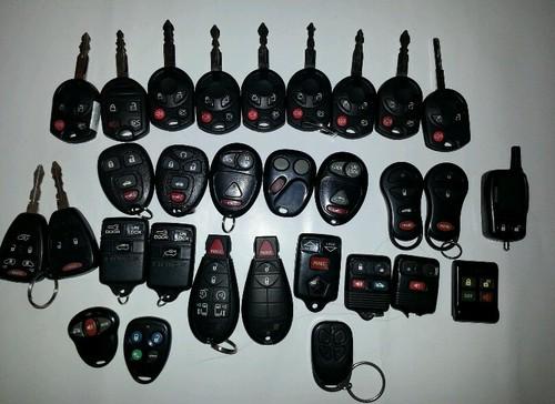 Lot of 30 key fobs ford chevy chrysler buick python etc