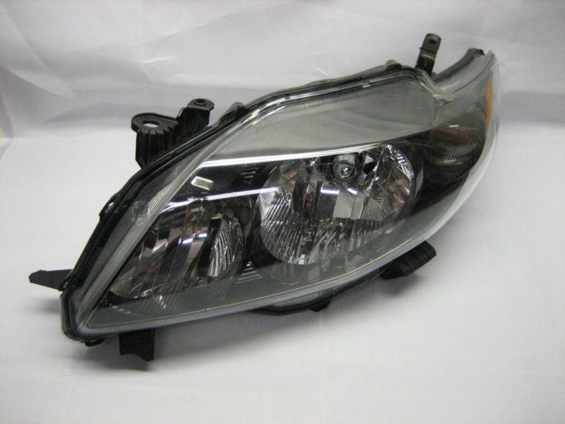 2009 2010 toyota corolla left / drivers side headlight assy. factory oem used