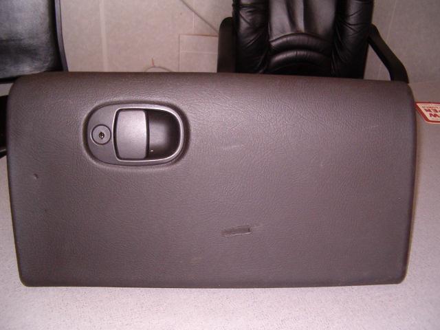 Glove box door for 2001 saturn l200