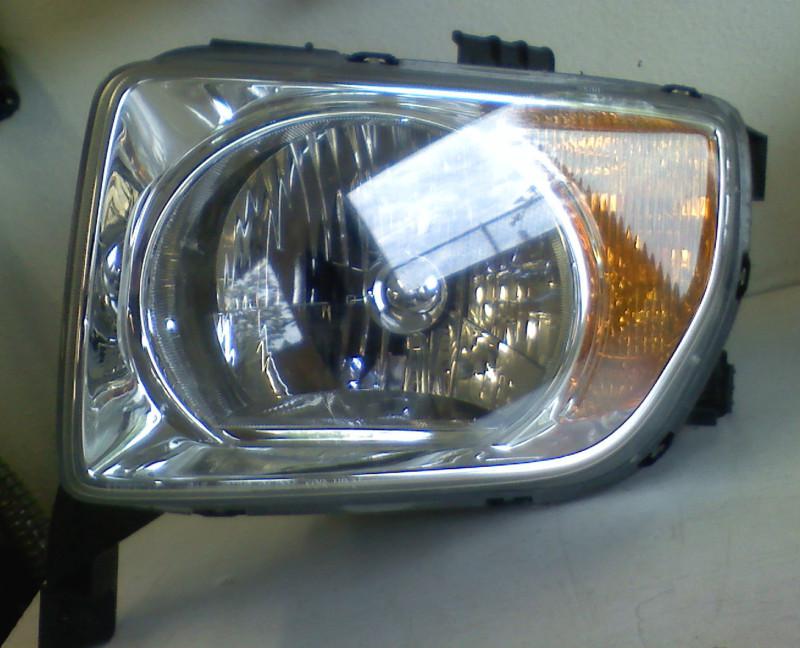  03-06 honda element  headlight driver side