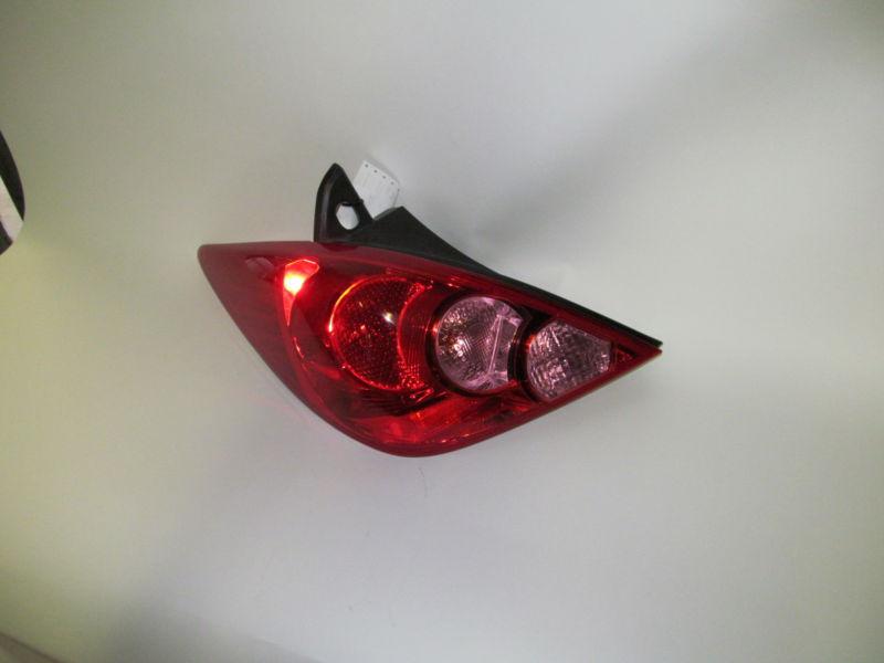 07 08 09 2010 2011 2012 nissan versa hatchback oem left tail light nice!