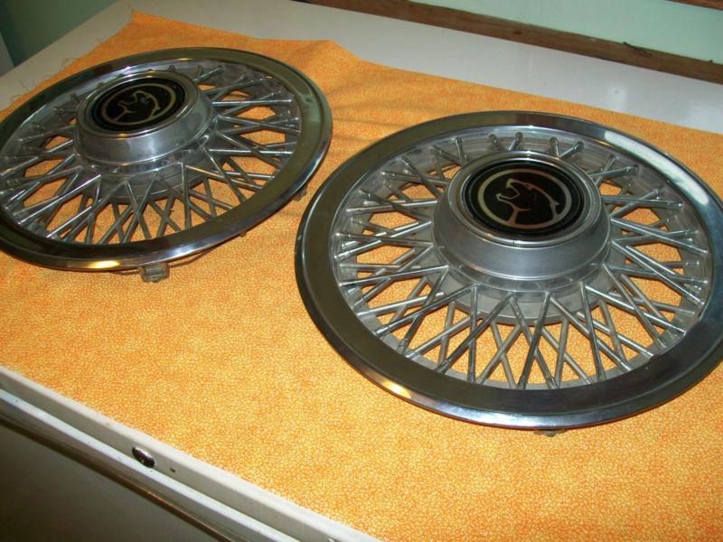 Cougar hubcaps pair