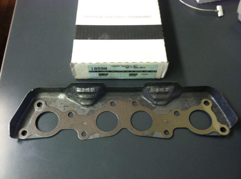 1989-94 mazda b2600 mpv 2.6 exhaust manifold gasket / heat shield