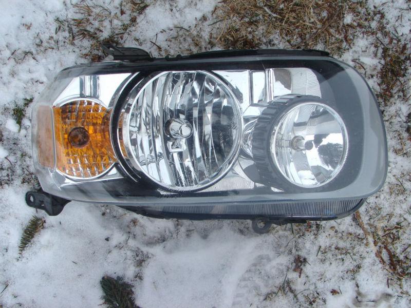 2005 06 07 escape headlight complete rh