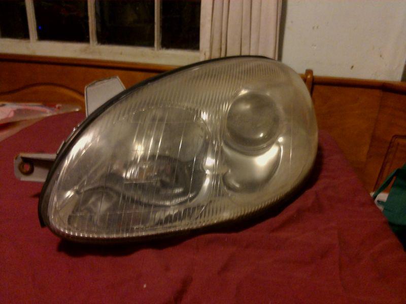 99 1999 daewoo leganza front left drivers side headlight capsule assembly