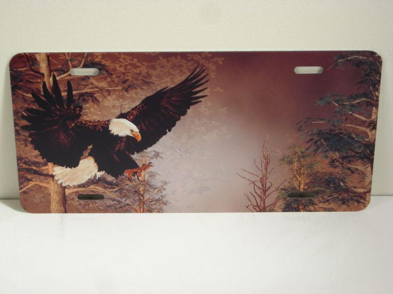 Eagle in flight brown tan metal license plate vanity tag