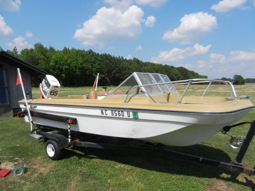 1973 johnson 65 hp stinger engine &amp; 1972 thunderhawk boat + good trailer.