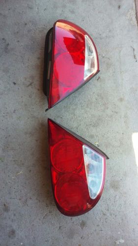 00-04 jaguar s-type left tail lights oem left and right