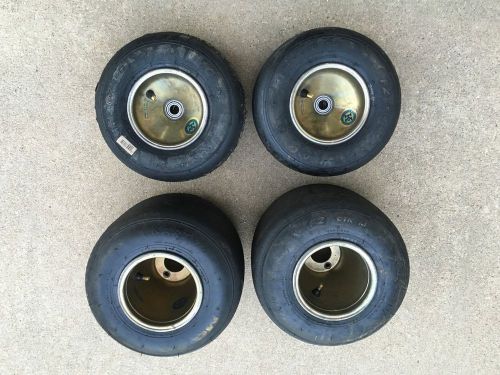 Set of 4 mg yellow kart racing tires on gold aluminum wheels