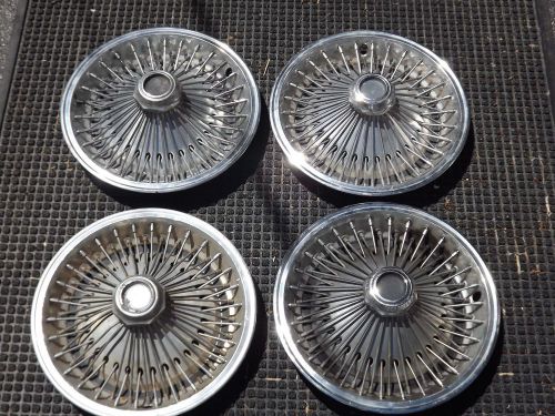 Four (4) 14&#034; wire wheel hub caps