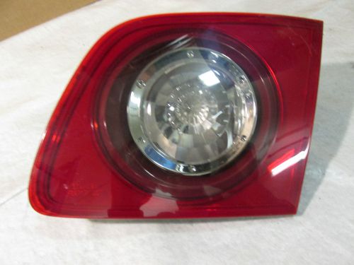 2004--2006  mazda 3   , tail gate inner trunk right  light