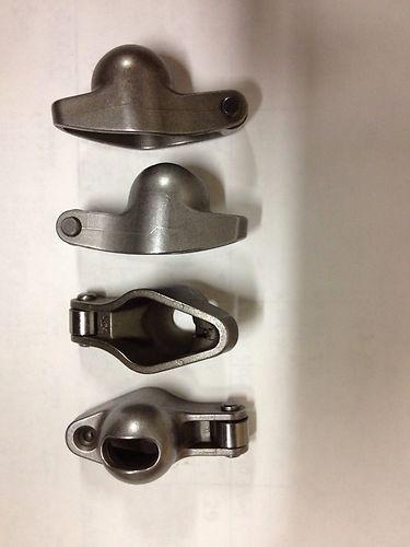 4- 1.6 ratio comp cams roller rockers-new not sure if 60or90 degr chevy v6,