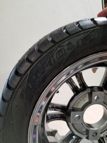 215x40-12 steeleng street 4 ply tire &amp; 12x7 steeleng gunmetal vampire rim