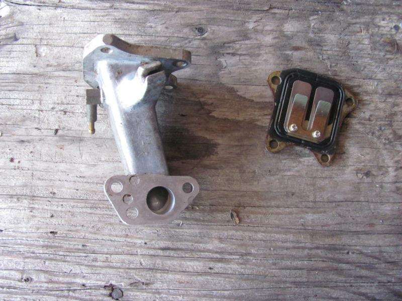 1977 honda express nc50 moped intake manifold and reed cage