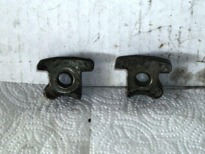 Axle stops. rear. chain adjuster. pair.  cb750 honda sohc.