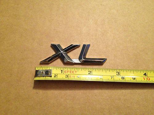 Used in great shape genuine oem "xl" emblem for 2005-2011 toyota avalon models