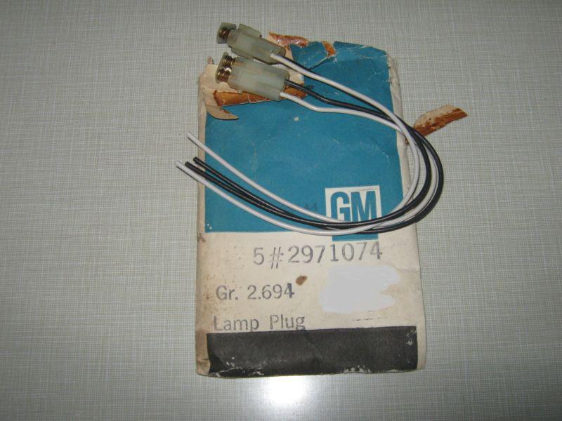 Chevy corvette  1954 - 57   lamp plugs nos