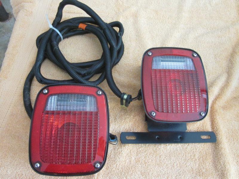 New grote freightliner tail light set with mounts and harness