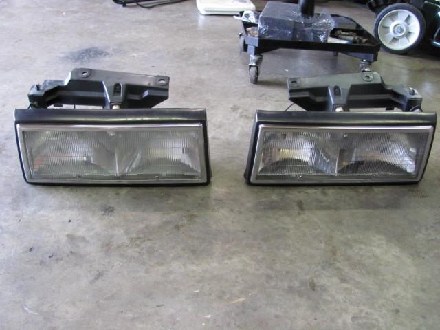 1991 1992 1993 cadillac deville fleetwood headlights headlamps pair lh rh oem