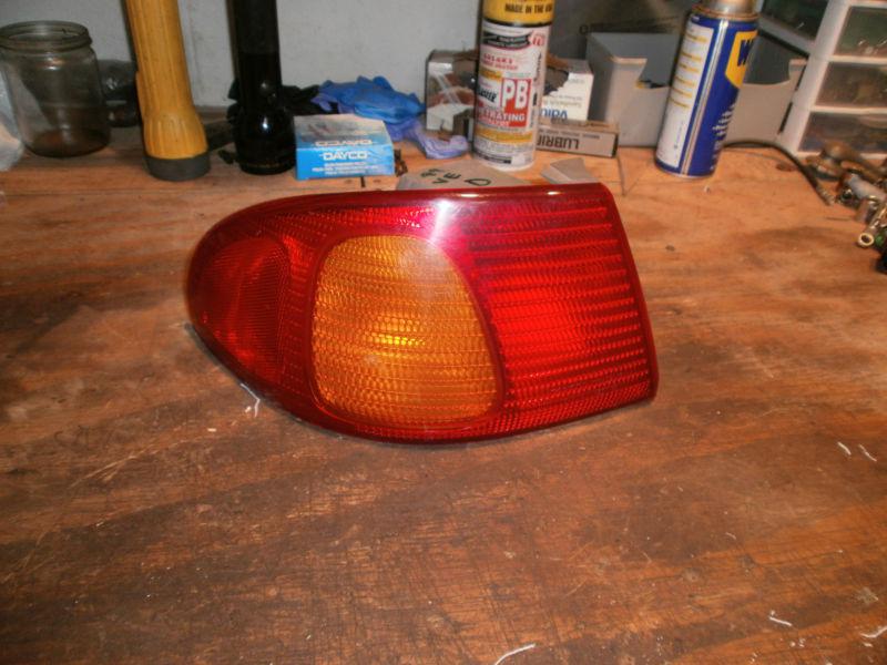 1998 1999 2000 toyota corolla tail lights backup lights grill 6 pieces oem used