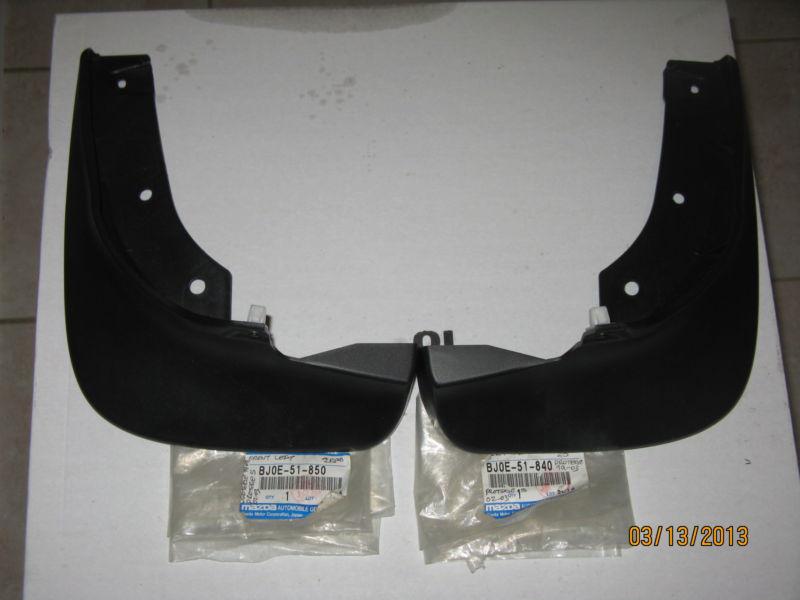 Mazda protege-protege 5 - 1999-2003 front  mud flaps left +right  -new oem 