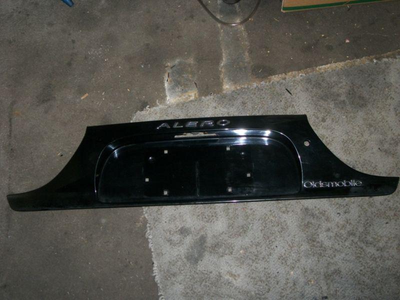 1999-2004 oldsmobile alero black trunk filler panel, good condition