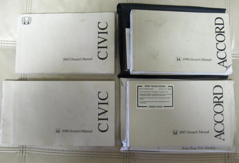 Assortment of honda civic & honda accord owner's manuals