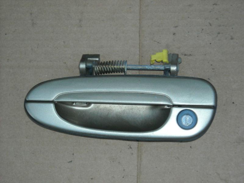 99 mazda 626 lx outside door handle l/f