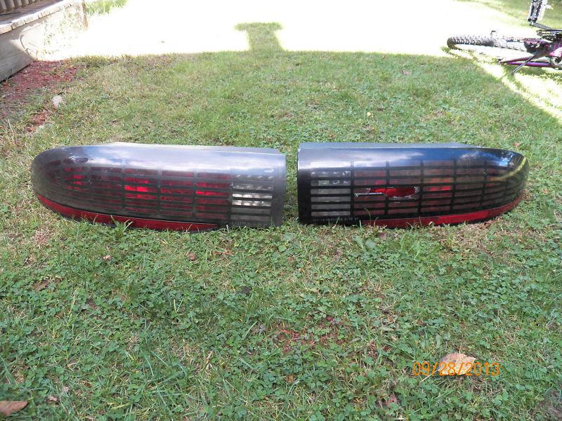 93-97 trans am firebird checkered tail light lens oem