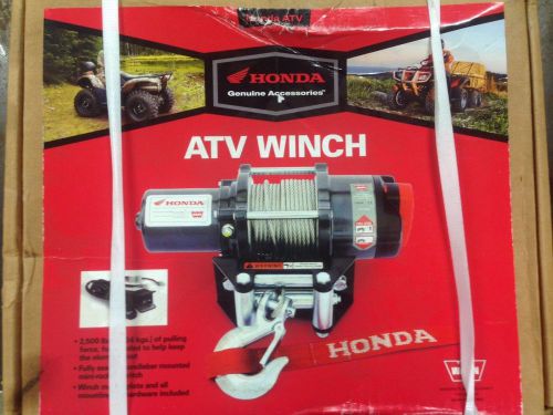 2500lbs atv winch honda / by warn 50ft of cable.