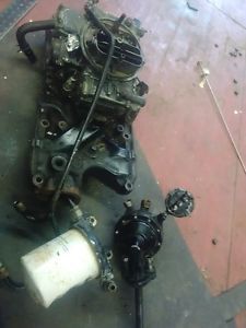 Mercruiser ford 302, 4 barrel intake manifold, holly carburetor +