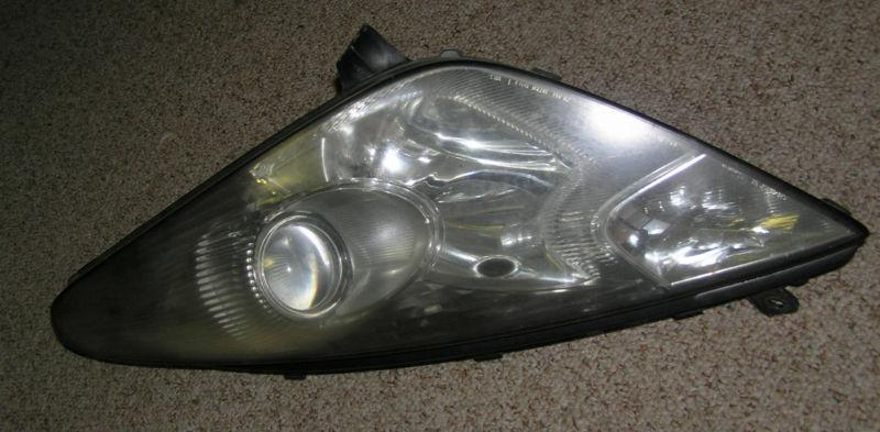 2000 oem toyota celica gt & gts headlight. drivers side 7th gen.