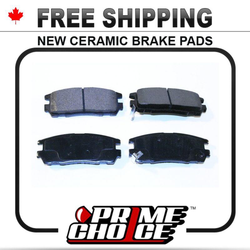 New premium complete set of rear ceramic disc brake pads with shims