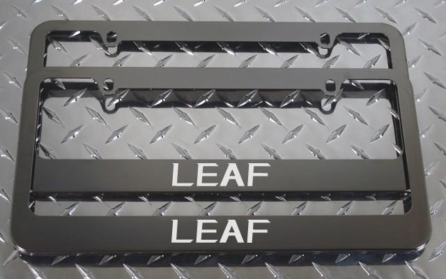 2 brand new nissan leaf gunmetal license plate frame + screw caps