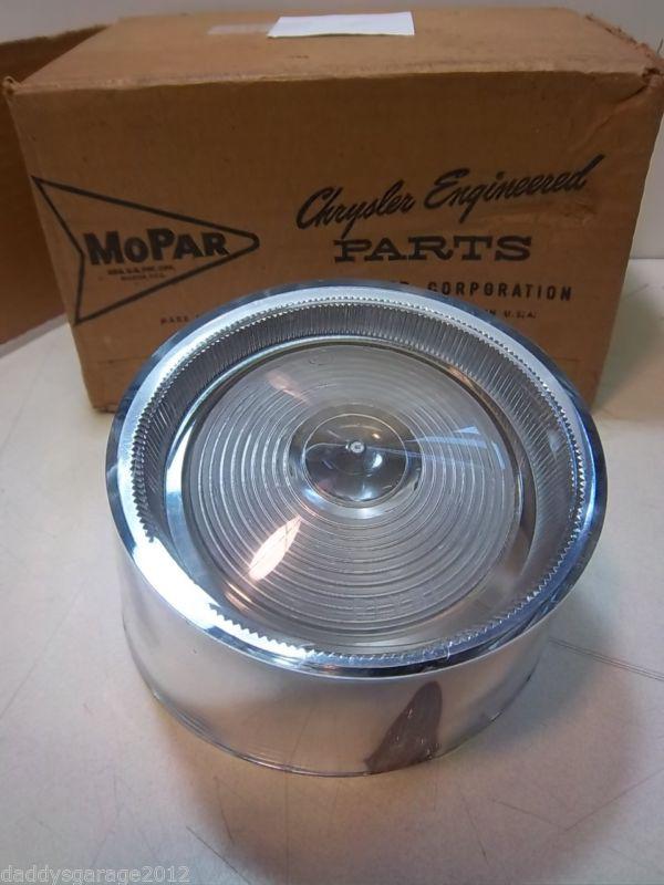 1957 plymouth wagon. nos. back up light. mopar, chrysler engineered parts