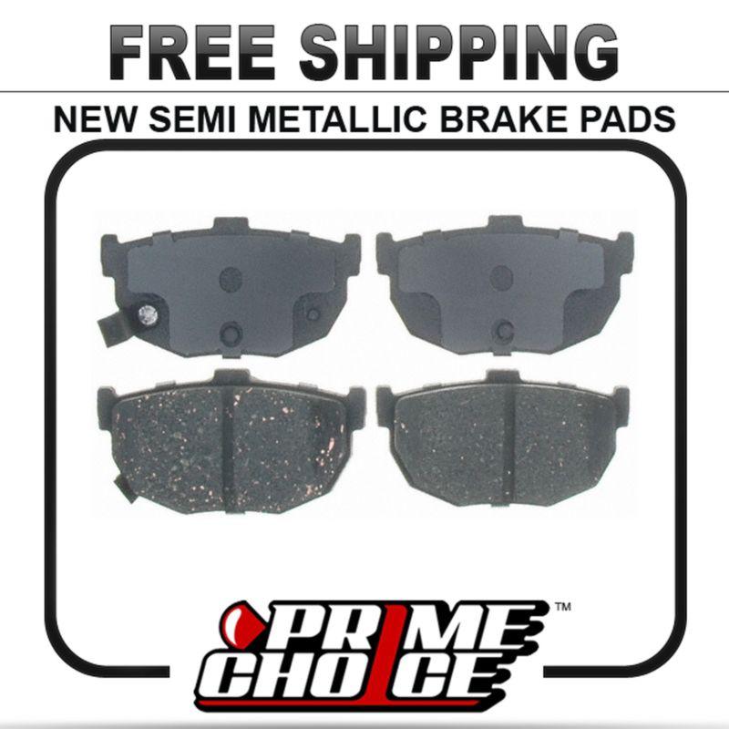 New premium complete set of rear metallic disc brake pads with shims